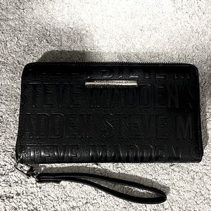 Steve Madden clutch/wallet black with silver hardware. Never used. NWOT
